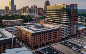 The Dillon Residences birds eye view with the city of Raleigh in the background.