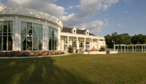 The design fits within the architectural style and context of the downtown area