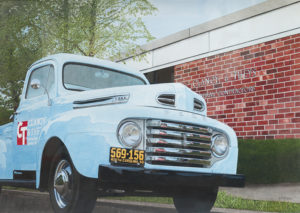light blue with red logo, Clancy & Theys truck