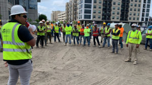 Clancy & Theys construction and logistics manager speaking to workers